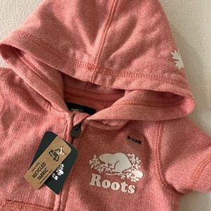 Roots baby onesie